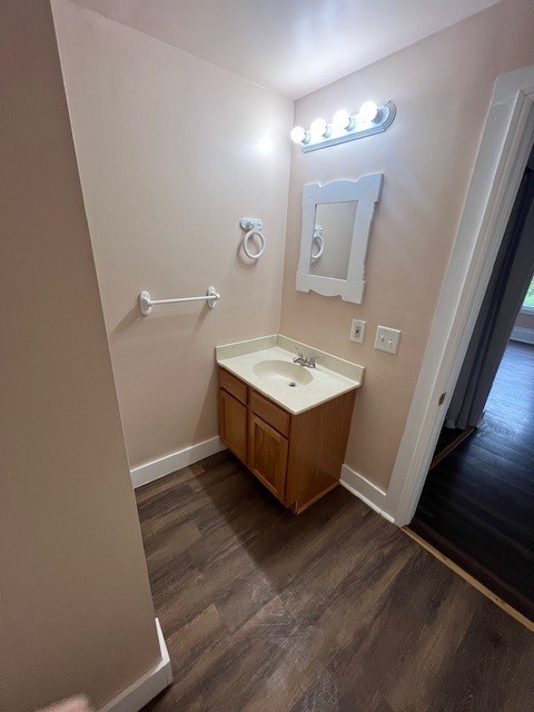 529 West Lincoln Avenue, Unit B Hinckley, IL 60520 - Photo 6 of 9 a spacious bathroom with a sink and a mirror