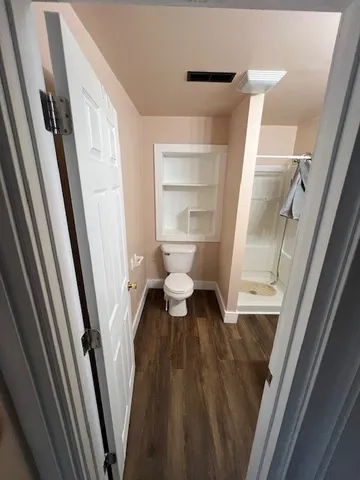 a bathroom with a sink and toilet