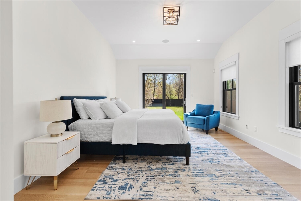 7 Fulton Road Lexington, MA 02420 - Photo 14 of 36 a bed room with bed and a couch