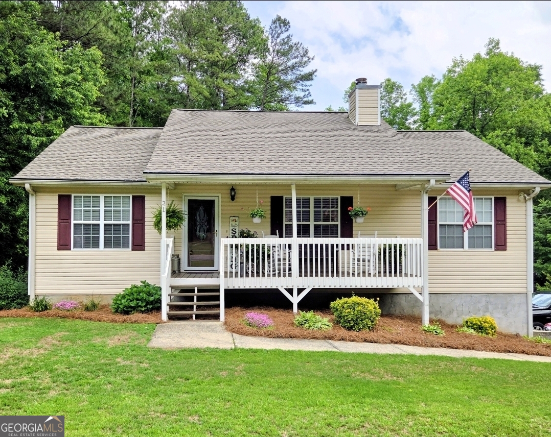 a front view of a house with a patio