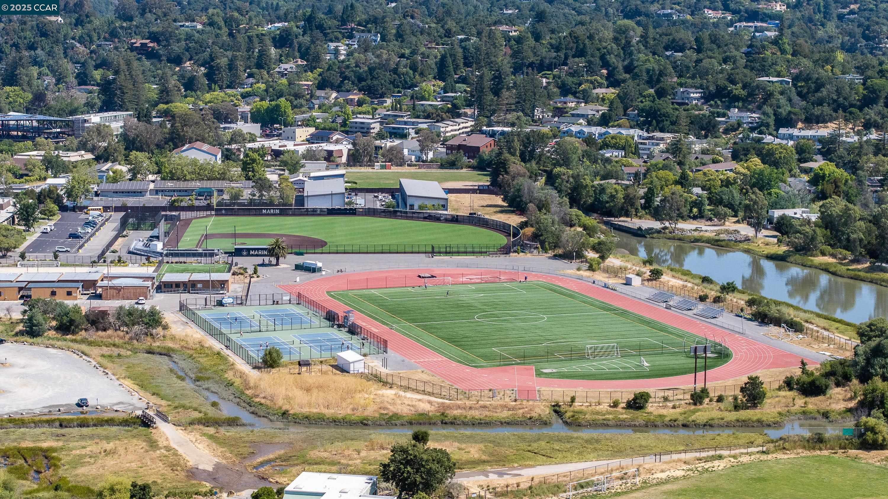 100 Black Log Road Kentfield, CA 94904 - Photo 21 of 27 a view of a swimming pool with a yard and outdoor seating