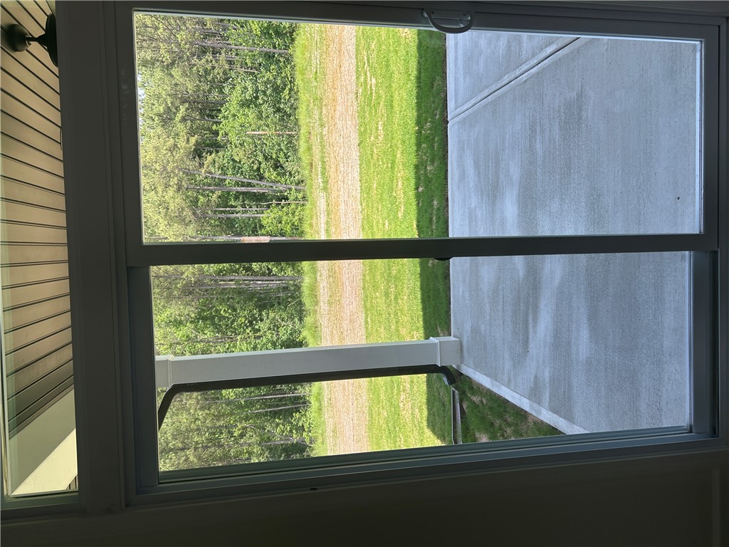 202 Bellflower Lane Pendleton, SC 29670 - Photo 23 of 27 A window offering a peaceful outlook onto a natural landscape.