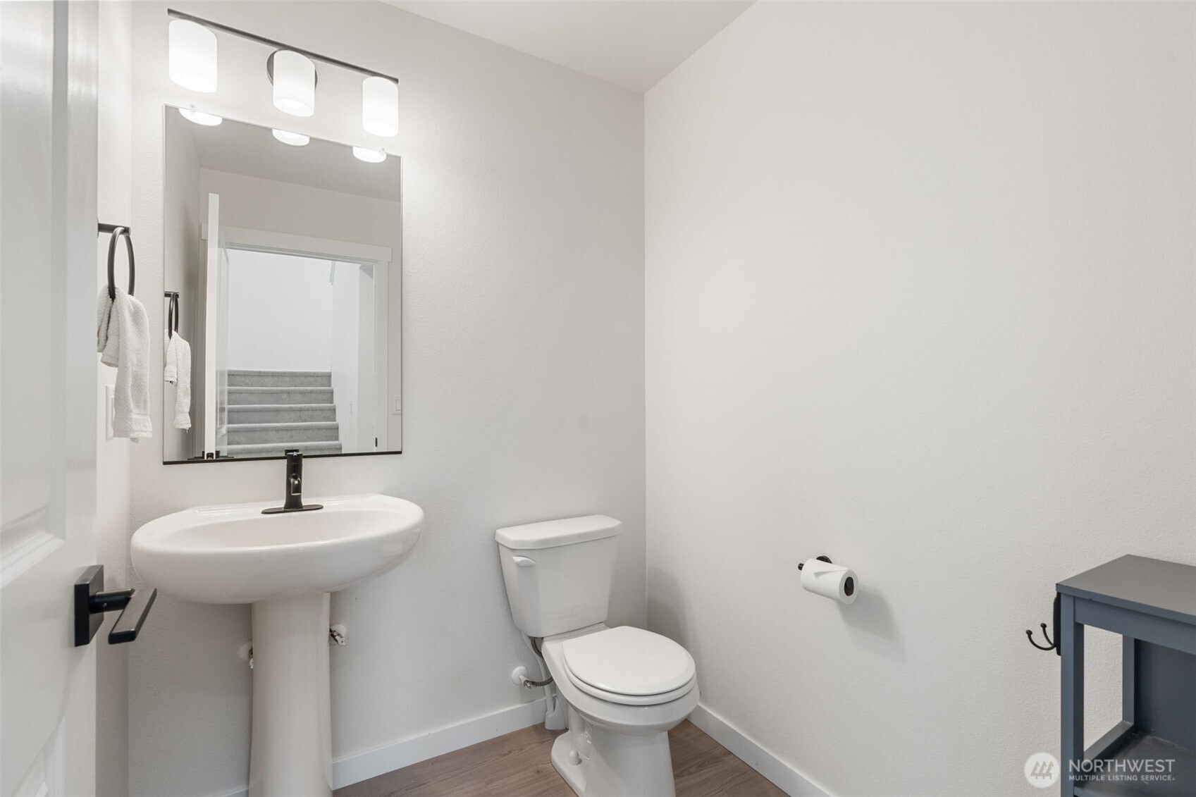 1090 Rw Fletcher Street Winlock, WA 98596 - Photo 15 of 40 a bathroom with a sink toilet and a mirror