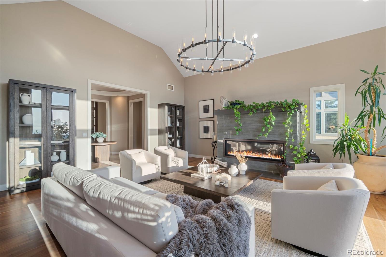 730 Genesee Mountain Road Golden, CO 80401 - Photo 6 of 50 a living room with furniture chandelier and a large window