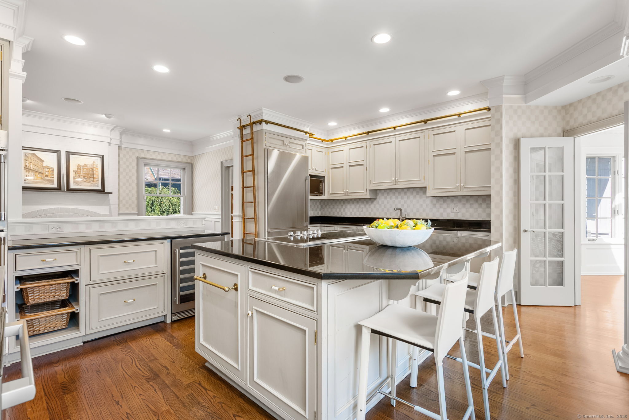 221 Greens Farms Road Westport, CT 06880 - Photo 11 of 39 a kitchen with a sink cabinets and wooden floor