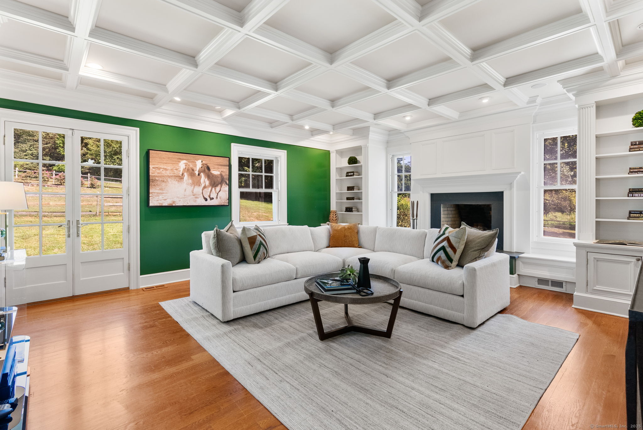 221 Greens Farms Road Westport, CT 06880 - Photo 16 of 39 a living room with furniture and a fireplace