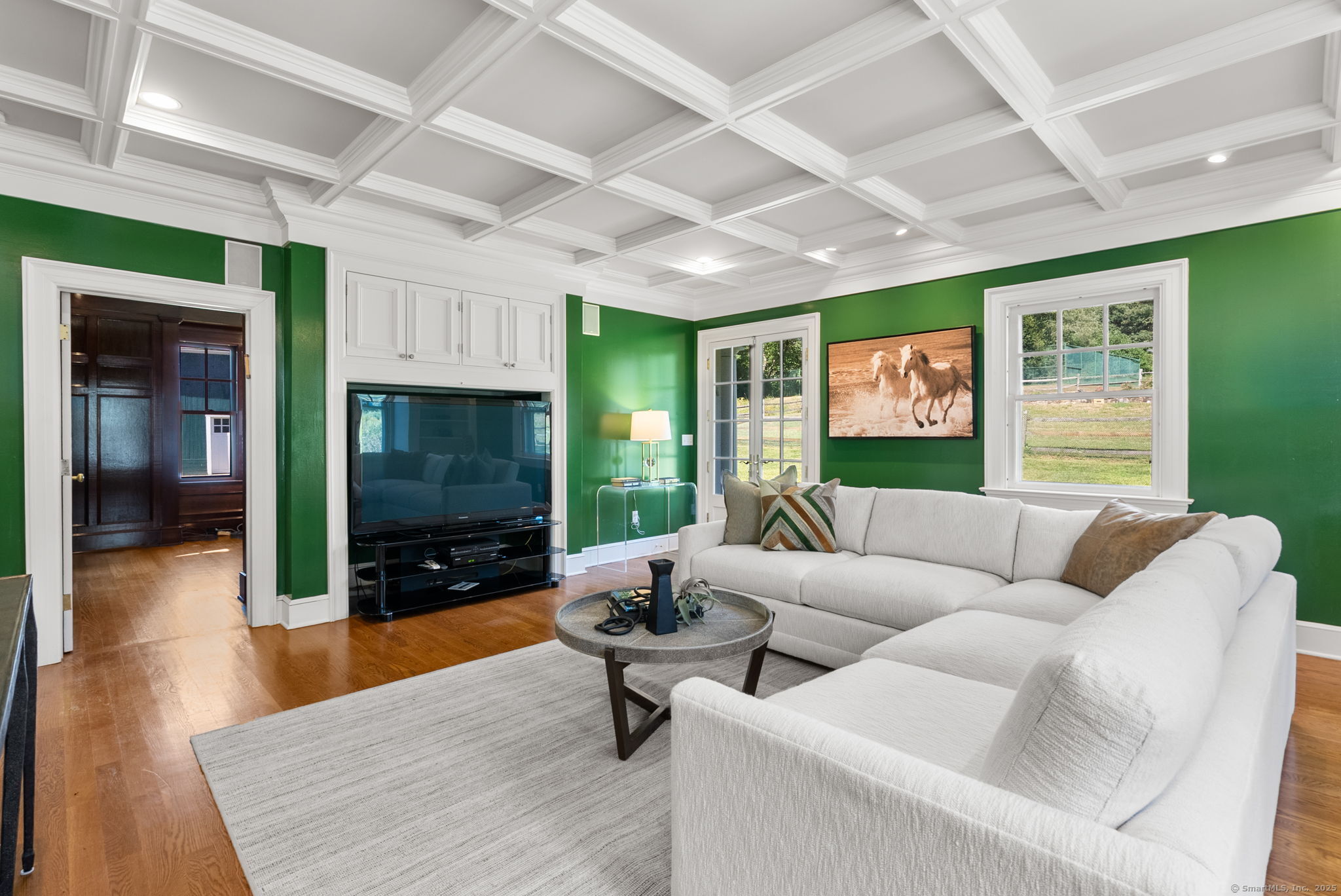 221 Greens Farms Road Westport, CT 06880 - Photo 17 of 39 a living room with furniture and a flat screen tv