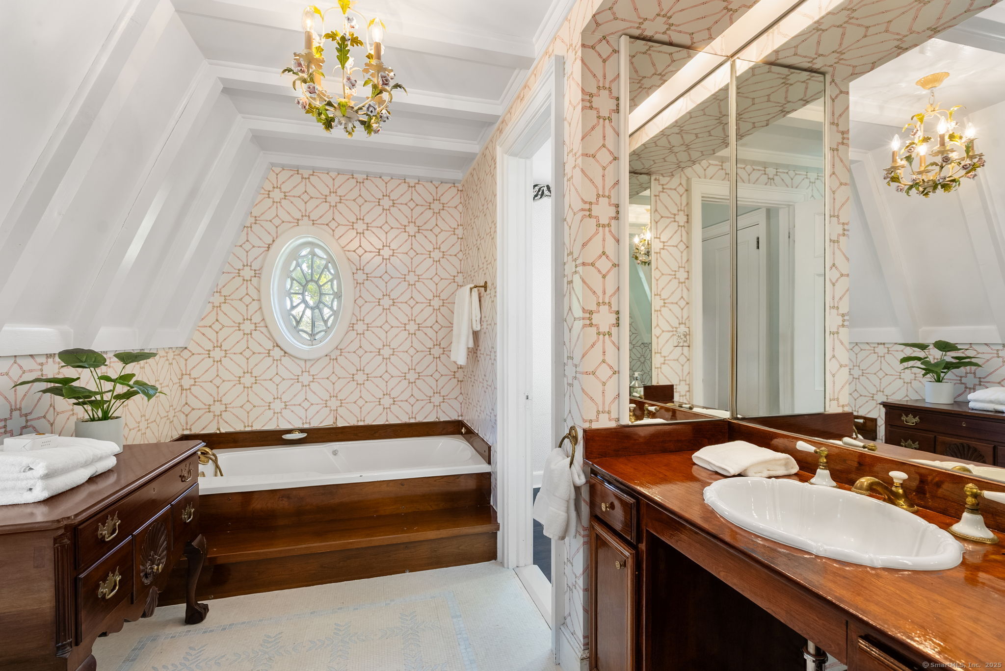 221 Greens Farms Road Westport, CT 06880 - Photo 22 of 39 a bathroom with a sink and a mirror