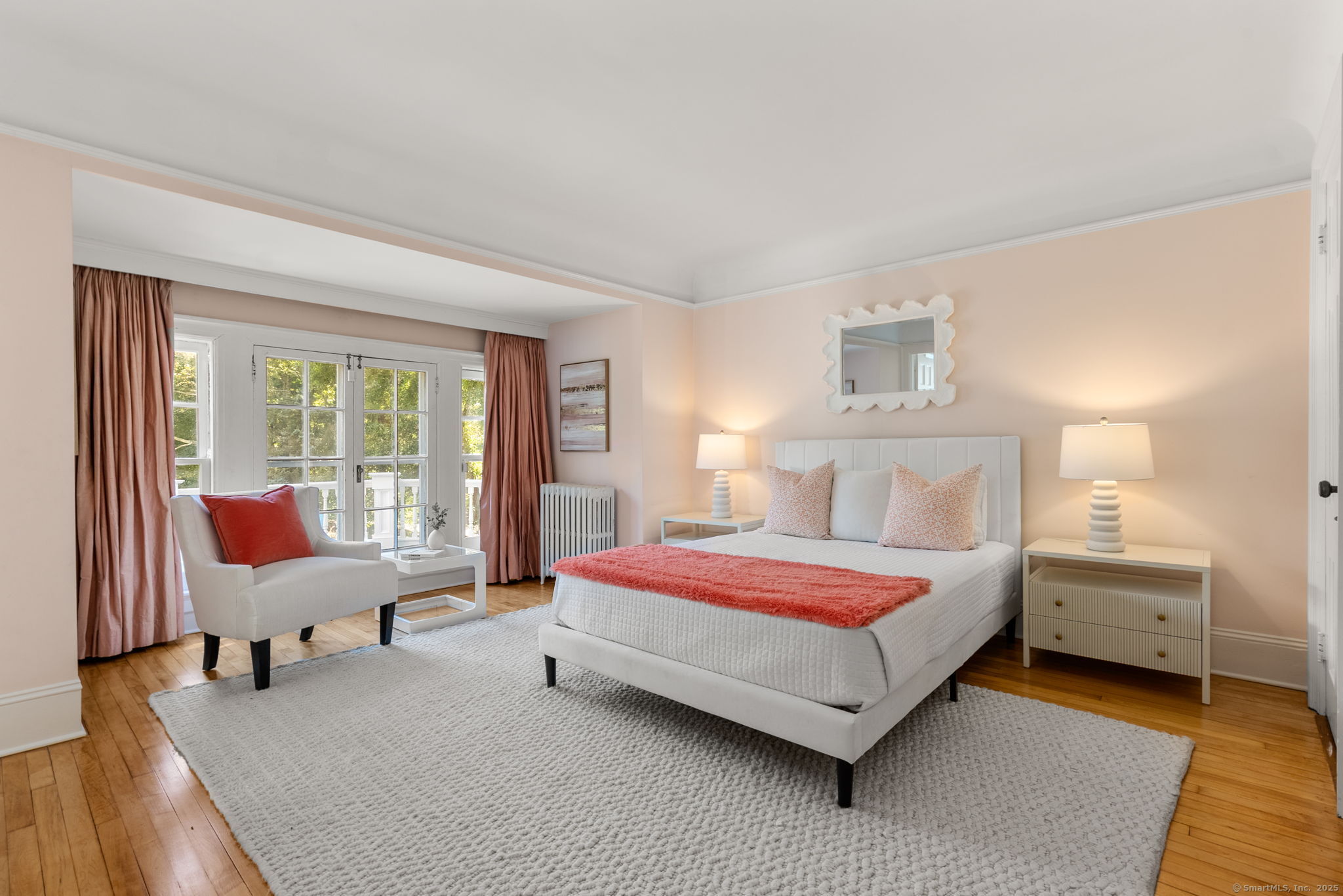 221 Greens Farms Road Westport, CT 06880 - Photo 24 of 39 a bedroom with a bed and a large window