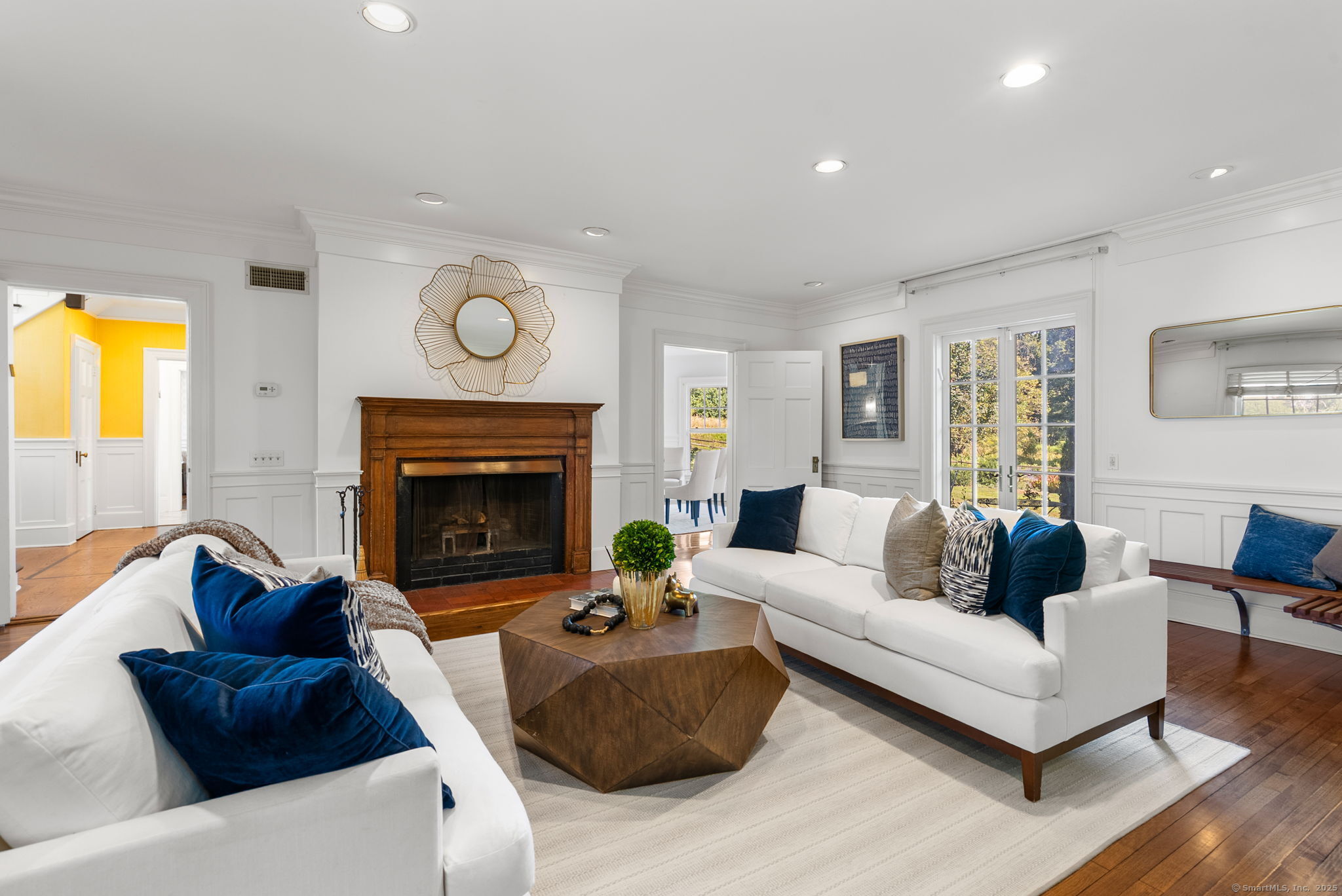 221 Greens Farms Road Westport, CT 06880 - Photo 5 of 39 a living room with furniture and a fireplace