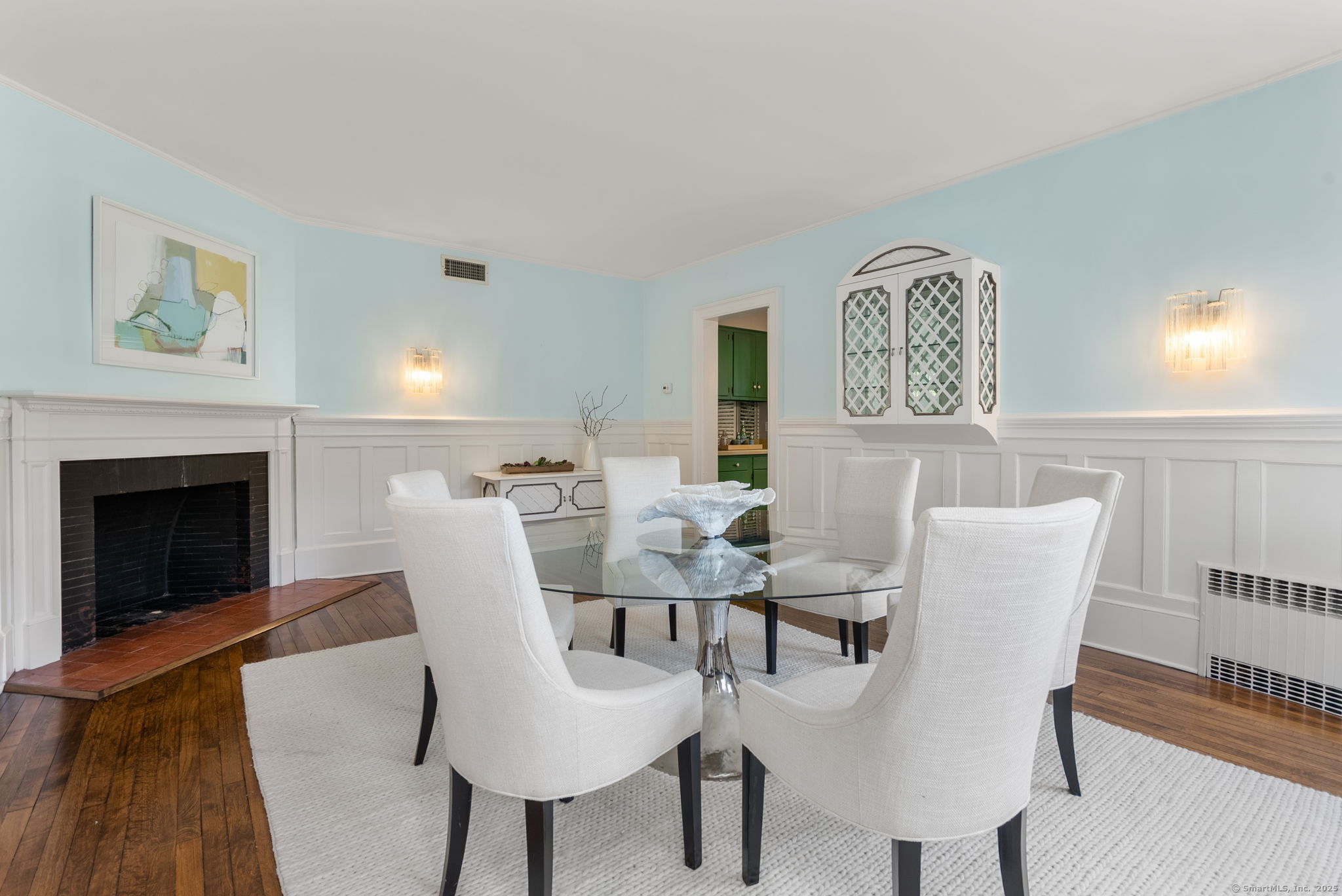 221 Greens Farms Road Westport, CT 06880 - Photo 7 of 39 a view of a dining room with furniture and wooden floor