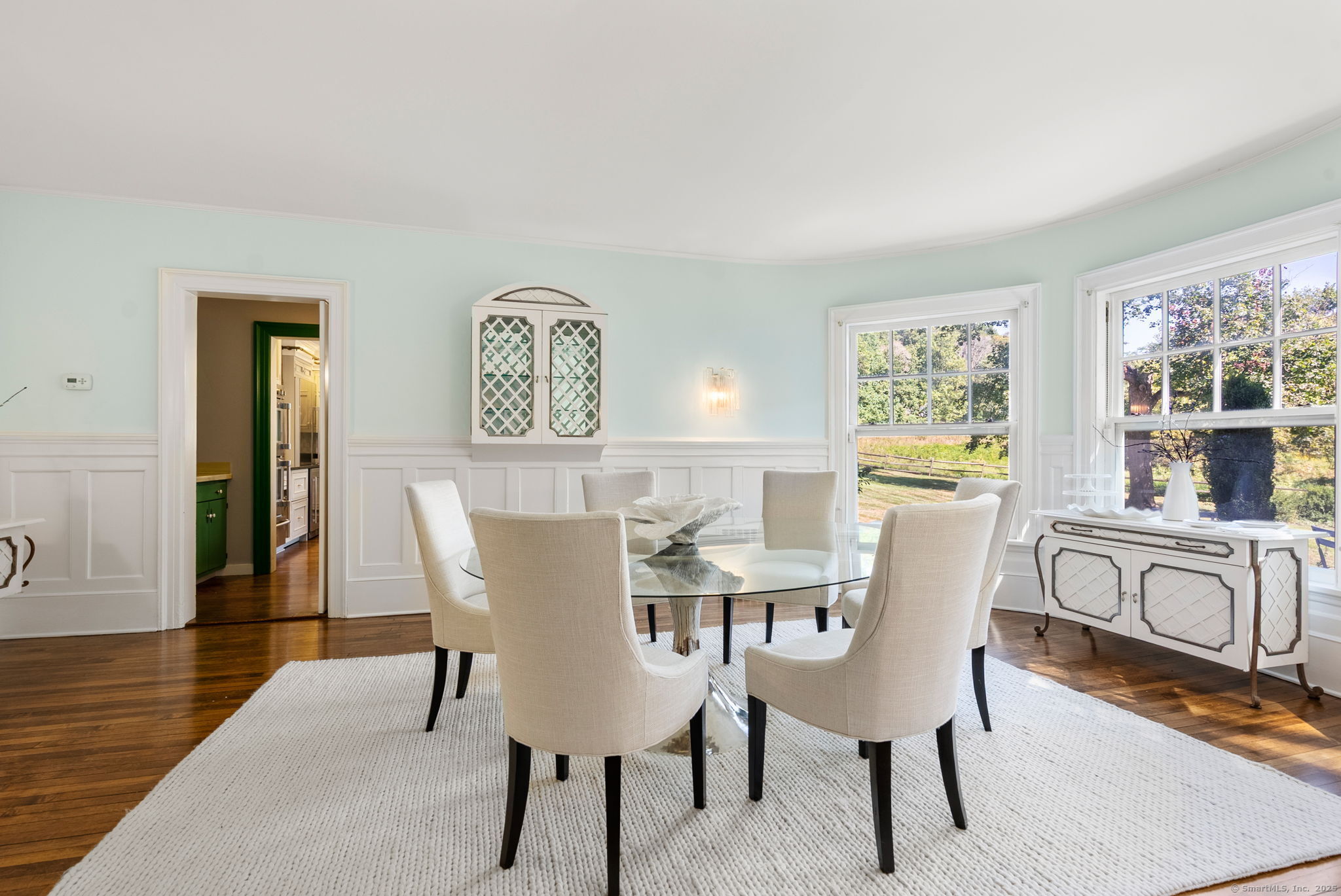 221 Greens Farms Road Westport, CT 06880 - Photo 8 of 39 a view of a dining room with furniture and a window