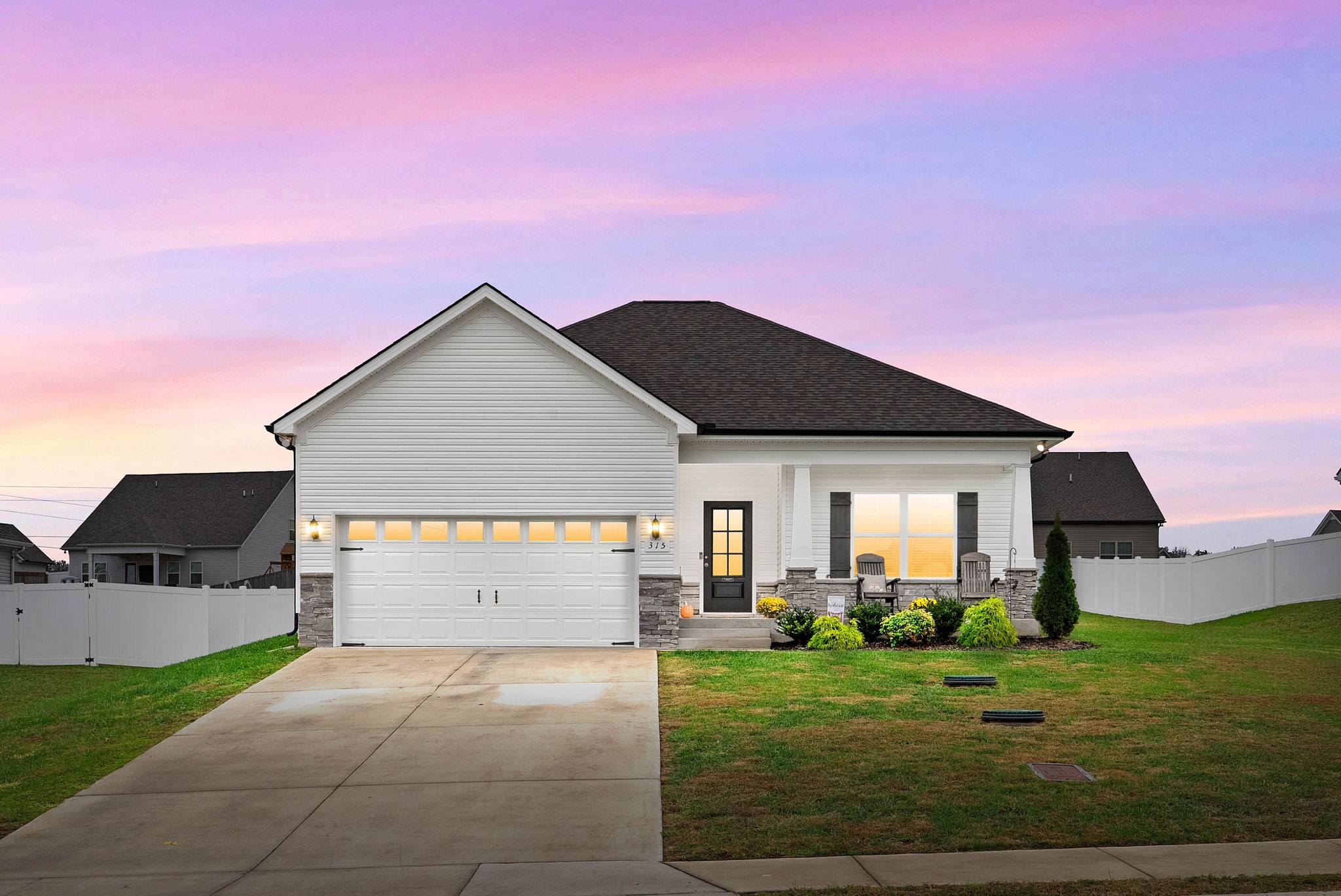 315 Windyhill Street Murfreesboro, TN 37129 - Photo 1 of 38 a front view of a house with garden