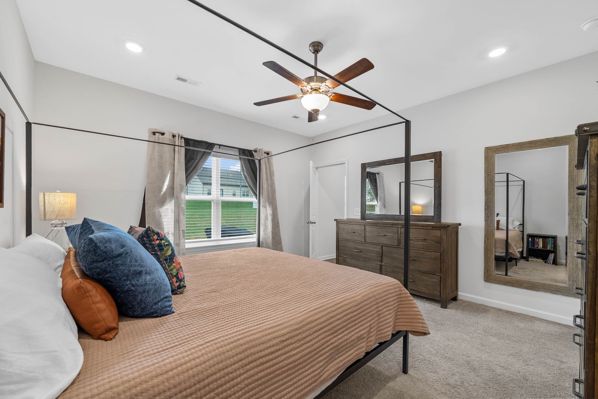 315 Windyhill Street Murfreesboro, TN 37129 - Photo 16 of 38 a bedroom with a large bed and a window