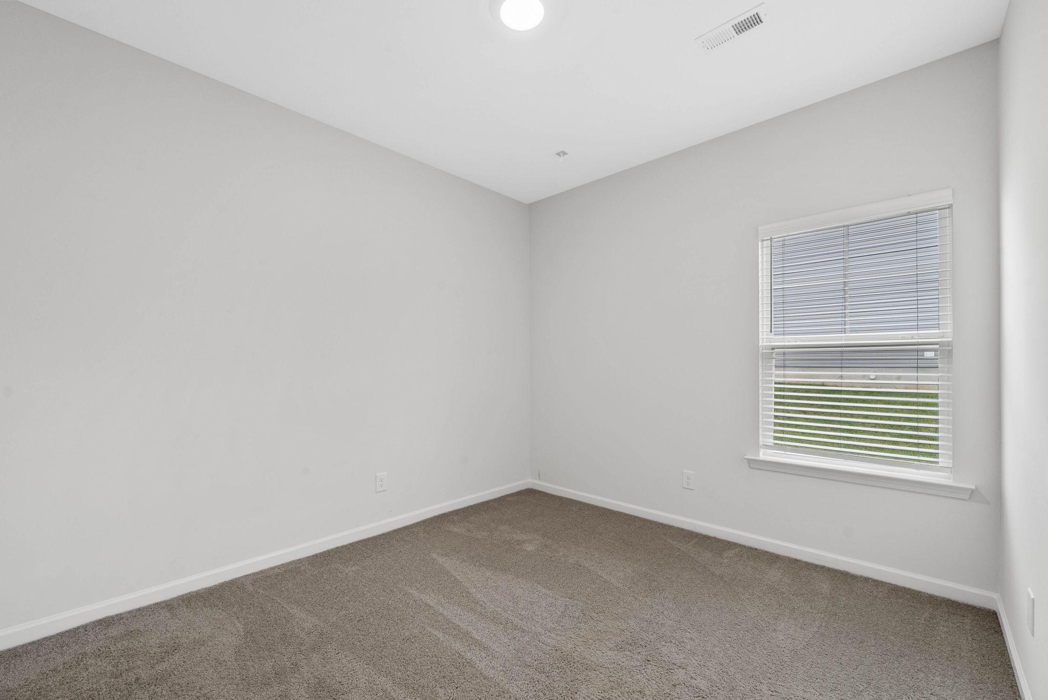 315 Windyhill Street Murfreesboro, TN 37129 - Photo 23 of 38 an empty room with a window