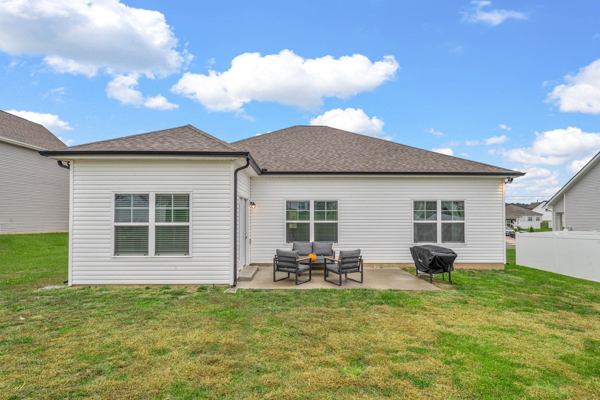315 Windyhill Street Murfreesboro, TN 37129 - Photo 27 of 38 a backyard of a house with table and chairs