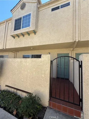 a view of front door and wooden door