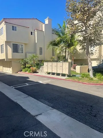 a view of a house with a street