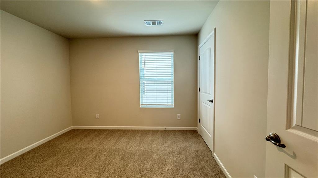 5114 Tulip Square Acworth, GA 30101 - Photo 22 of 36 an empty room with a window