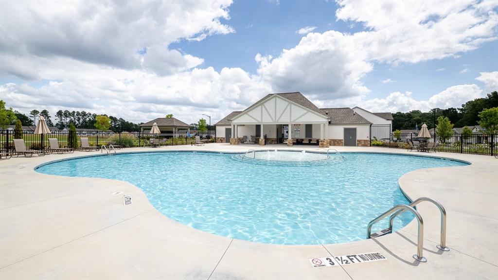 5114 Tulip Square Acworth, GA 30101 - Photo 35 of 36 a view of a lake with a house in the background