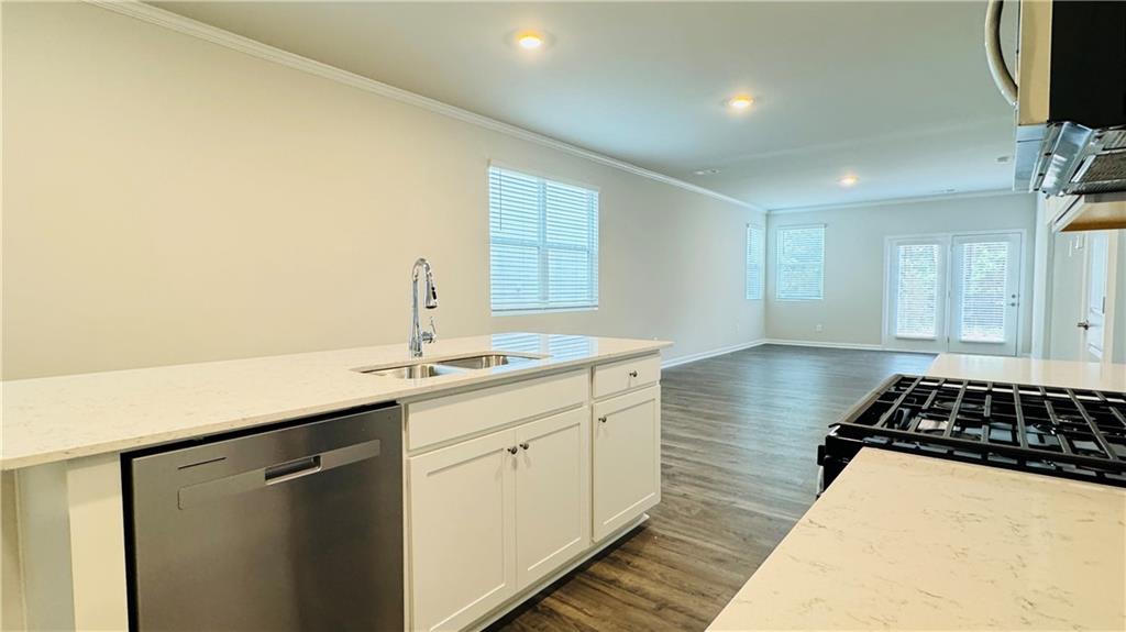 5114 Tulip Square Acworth, GA 30101 - Photo 8 of 36 a kitchen with a sink and a stove top oven
