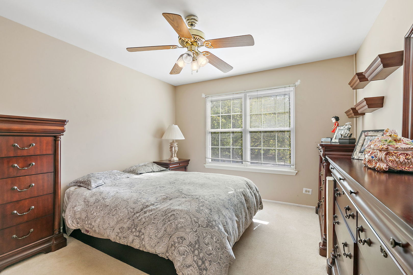 133 White Branch Court South, Unit 133 Schaumburg, IL 60107 - Photo 20 of 27 a bedroom with a bed and a window
