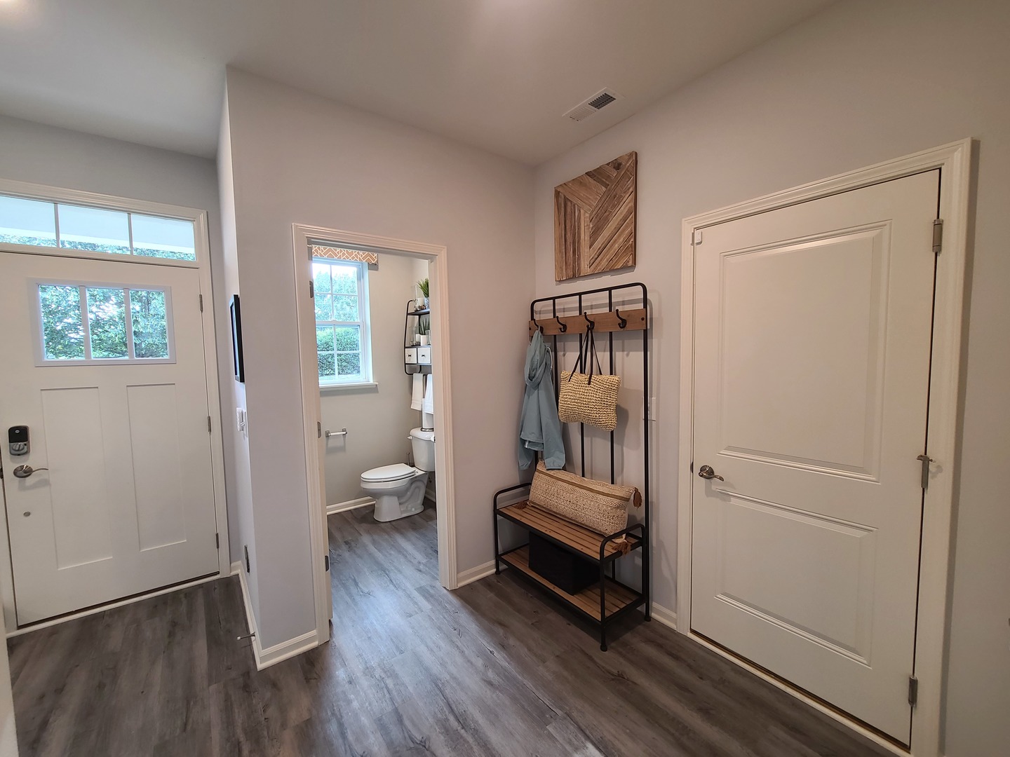 1214 Draper Road McHenry, IL 60050 - Photo 3 of 33 a view of a room with wooden floor bathroom and windows