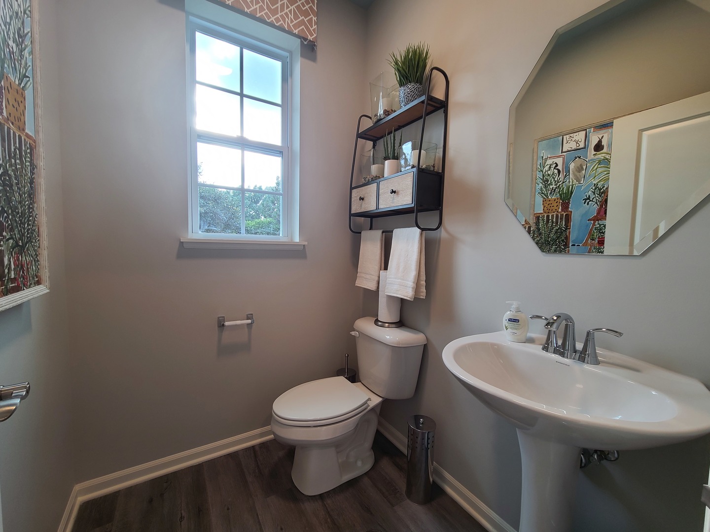 1214 Draper Road McHenry, IL 60050 - Photo 10 of 33 a white toilet sitting next to a bathroom sink