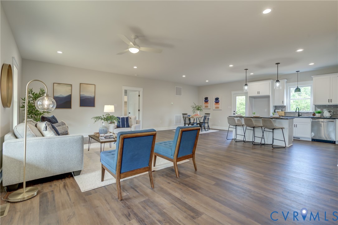 5306 St Pauls Church Road Goochland, VA 23063 - Photo 12 of 35 a living room with furniture and kitchen view