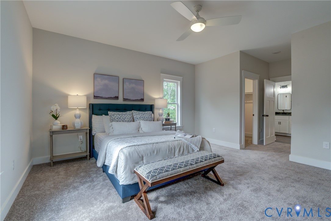 5306 St Pauls Church Road Goochland, VA 23063 - Photo 26 of 35 a spacious bedroom with a bed and a cabinets