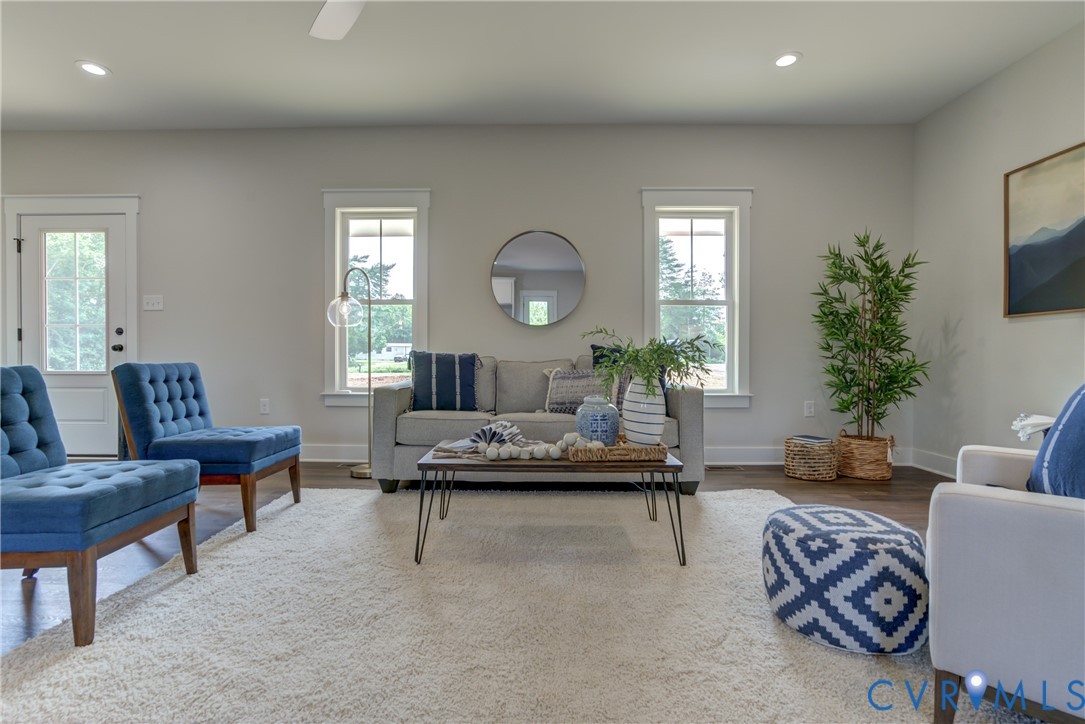 5306 St Pauls Church Road Goochland, VA 23063 - Photo 8 of 35 a living room with furniture and a potted plant