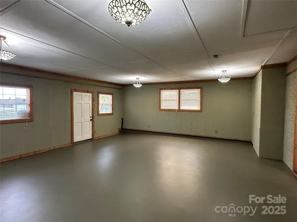 a view of a livingroom with a fireplace