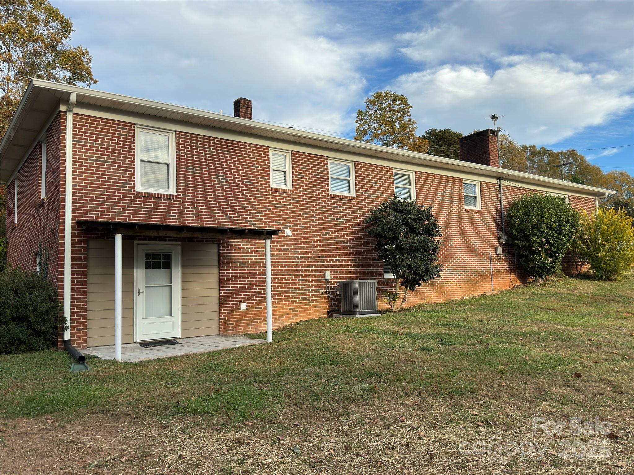 2945 Freezer Locker Road Hudson, NC 28638 - Photo 36 of 38 a front view of a house with garden