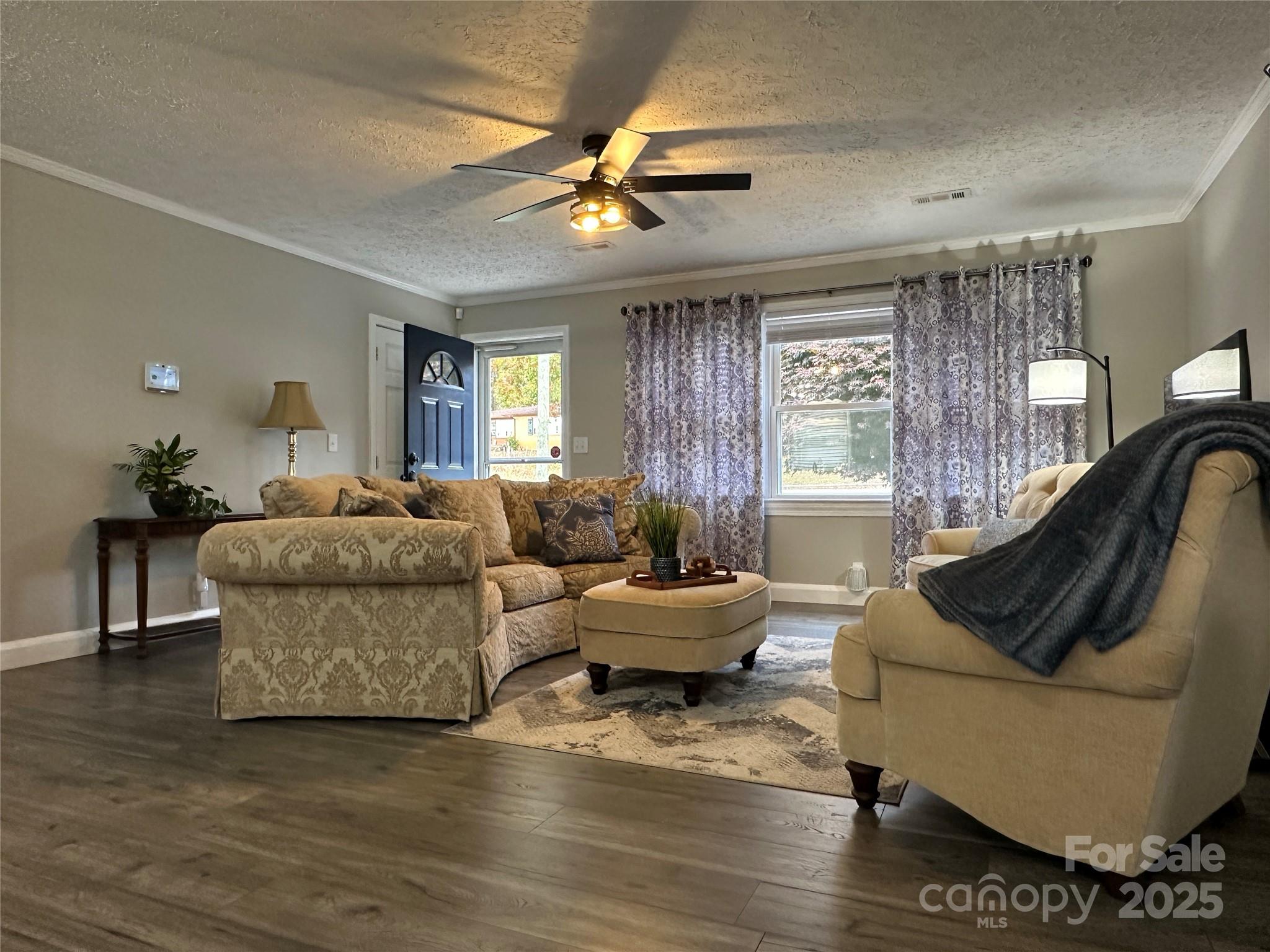 2945 Freezer Locker Road Hudson, NC 28638 - Photo 10 of 38 a living room with furniture and a large window