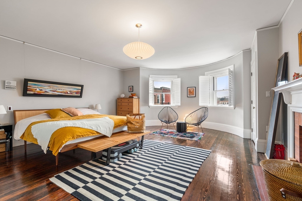 49 Garrison Road Brookline, MA 02445 - Photo 15 of 25 a living room with furniture and a flat screen tv
