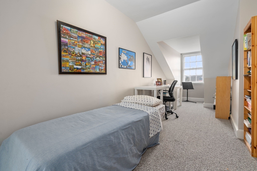49 Garrison Road Brookline, MA 02445 - Photo 21 of 25 a bedroom with a bed and a desk