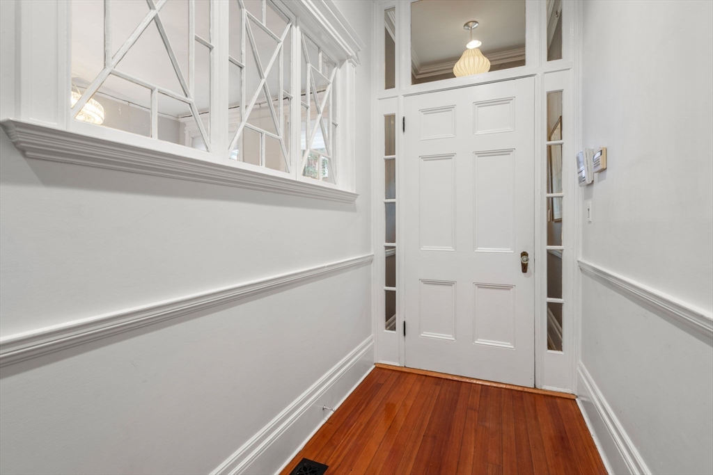 49 Garrison Road Brookline, MA 02445 - Photo 3 of 25 a view of front door with wooden floor
