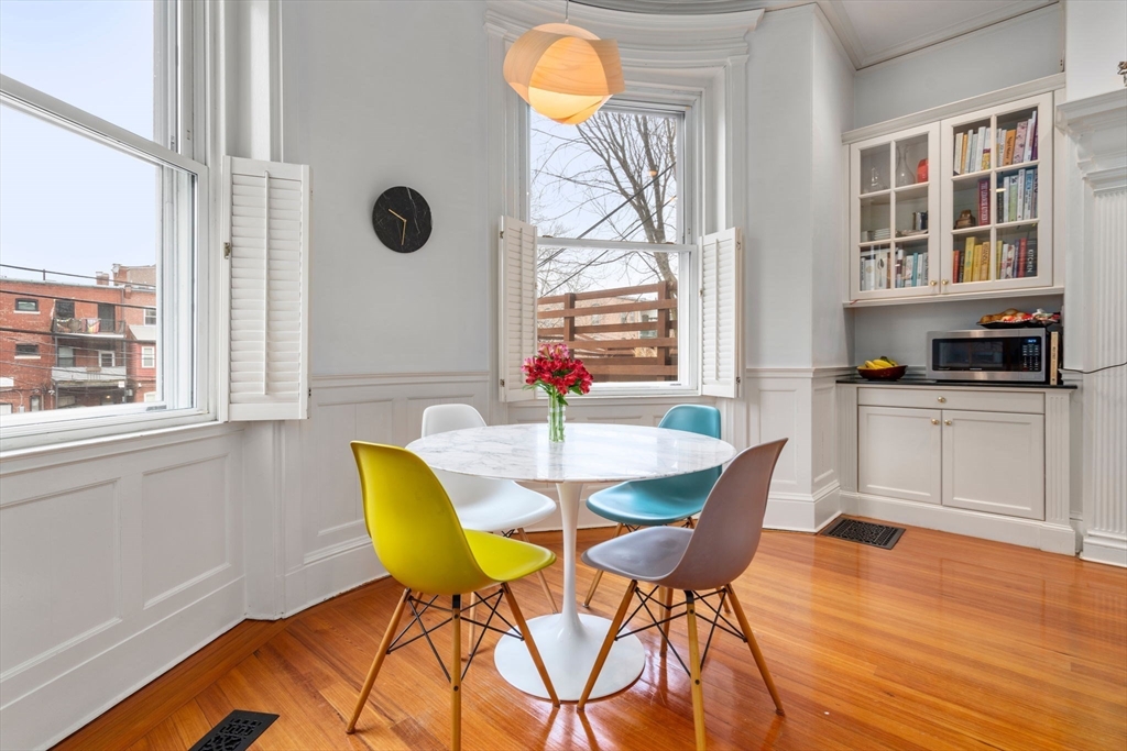 49 Garrison Road Brookline, MA 02445 - Photo 7 of 25 a dining room with furniture and window