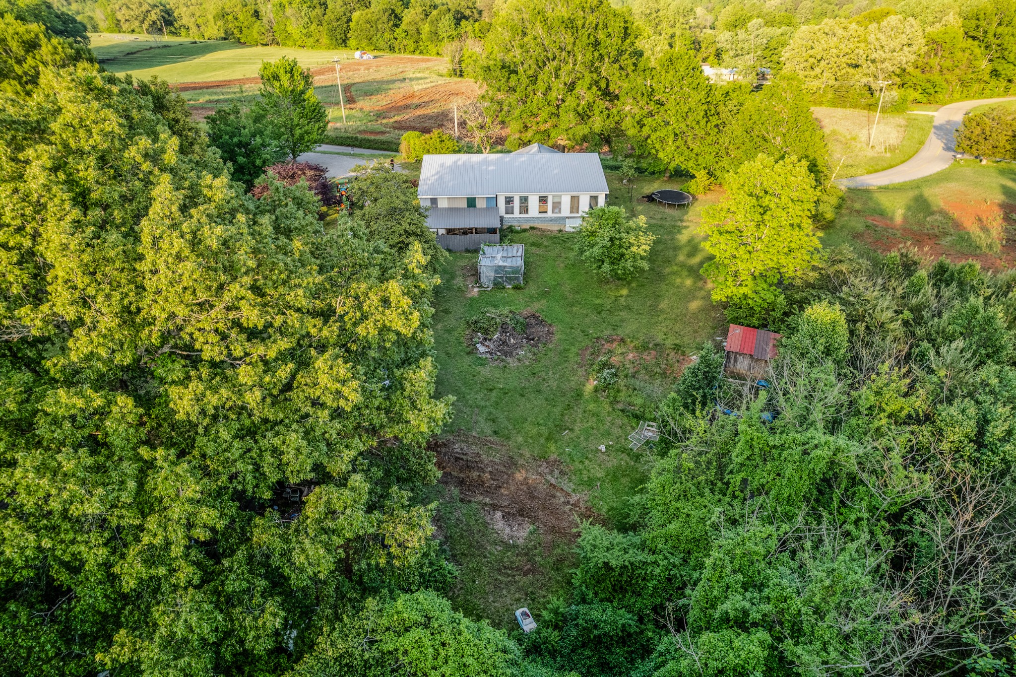 2000 Myers Cove Road McMinnville, TN 37110 - Photo 17 of 76 a sign that is sitting in front of a tree