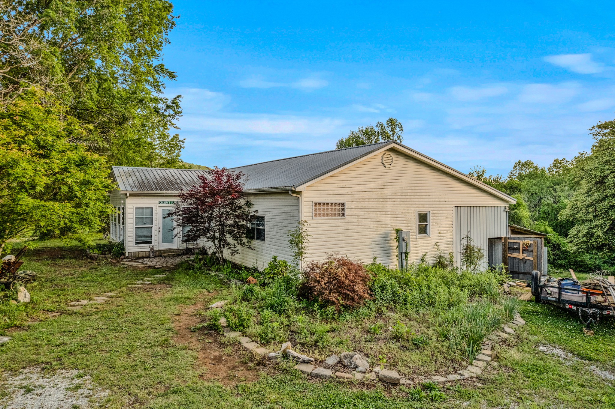 2000 Myers Cove Road McMinnville, TN 37110 - Photo 2 of 76 a view of a house with a yard