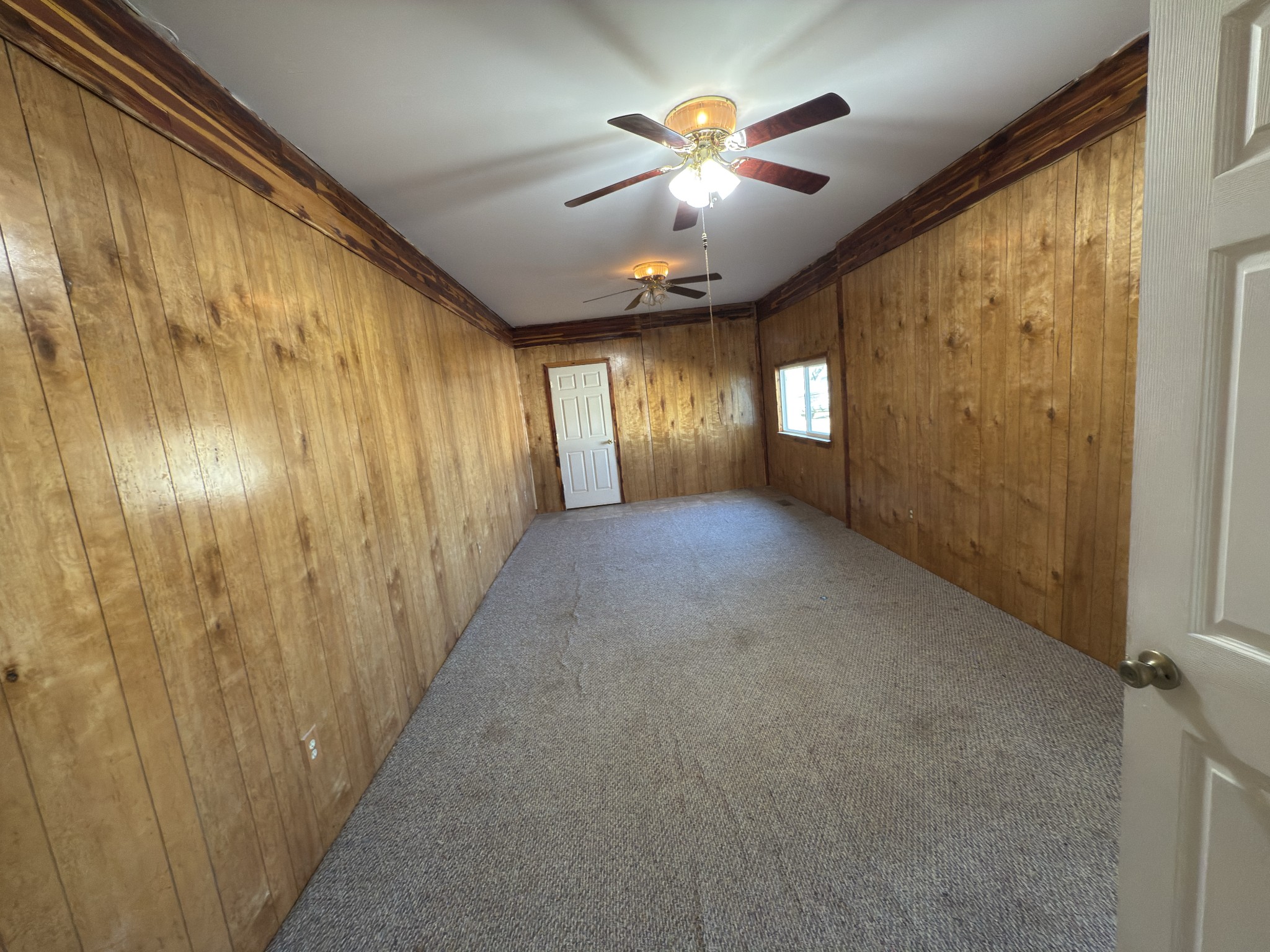2000 Myers Cove Road McMinnville, TN 37110 - Photo 26 of 76 a view of a hallway with a chandelier