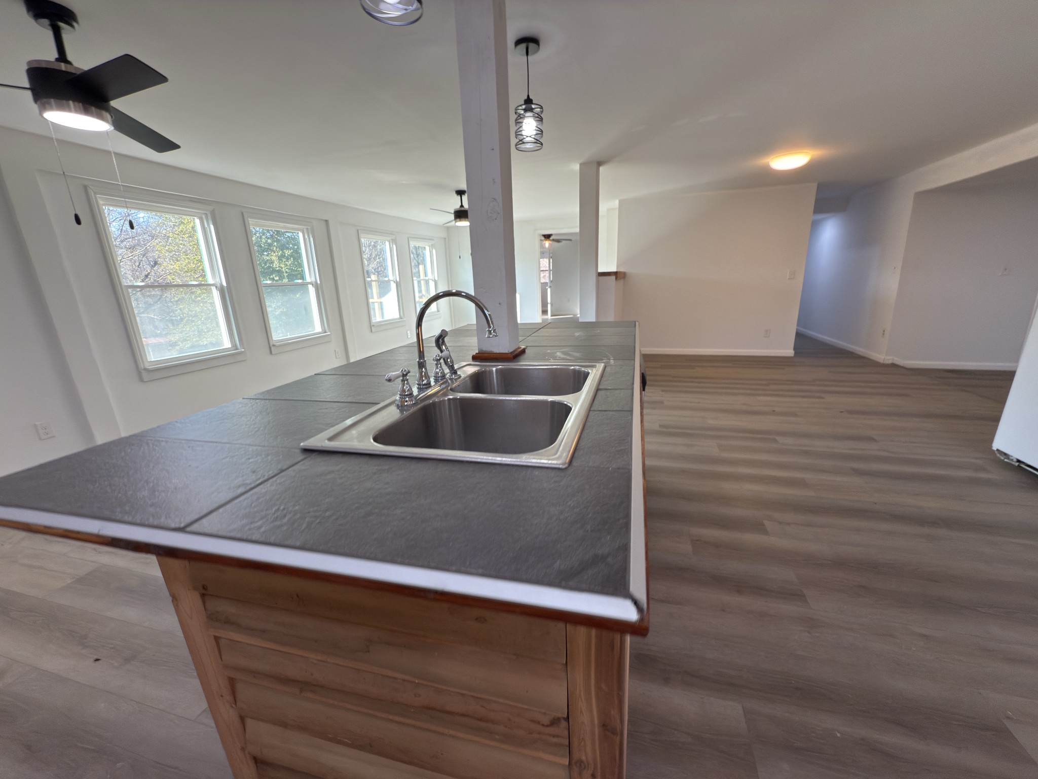 2000 Myers Cove Road McMinnville, TN 37110 - Photo 40 of 76 a kitchen with kitchen island a sink appliances and cabinets