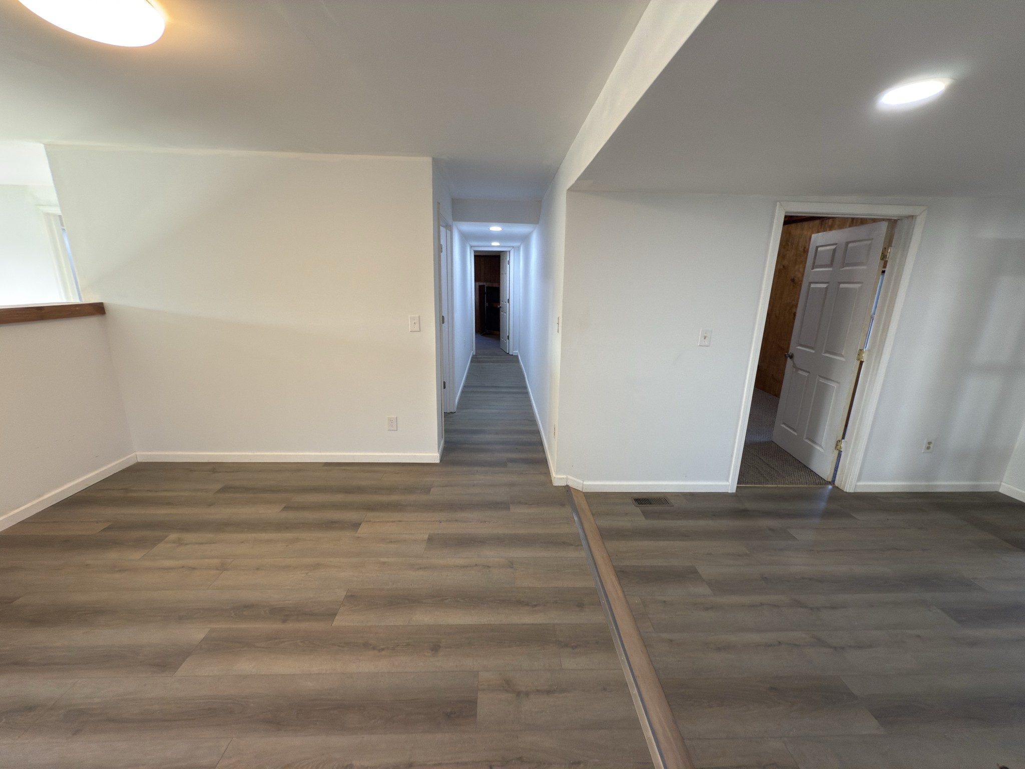 2000 Myers Cove Road McMinnville, TN 37110 - Photo 44 of 76 a view of an empty room with wooden floor and a window