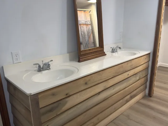 a bathroom with a toilet and a sink