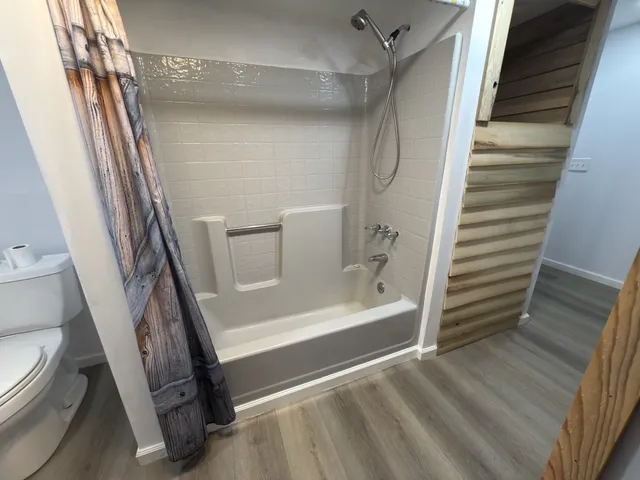 a bathroom with a sink vanity and a mirror