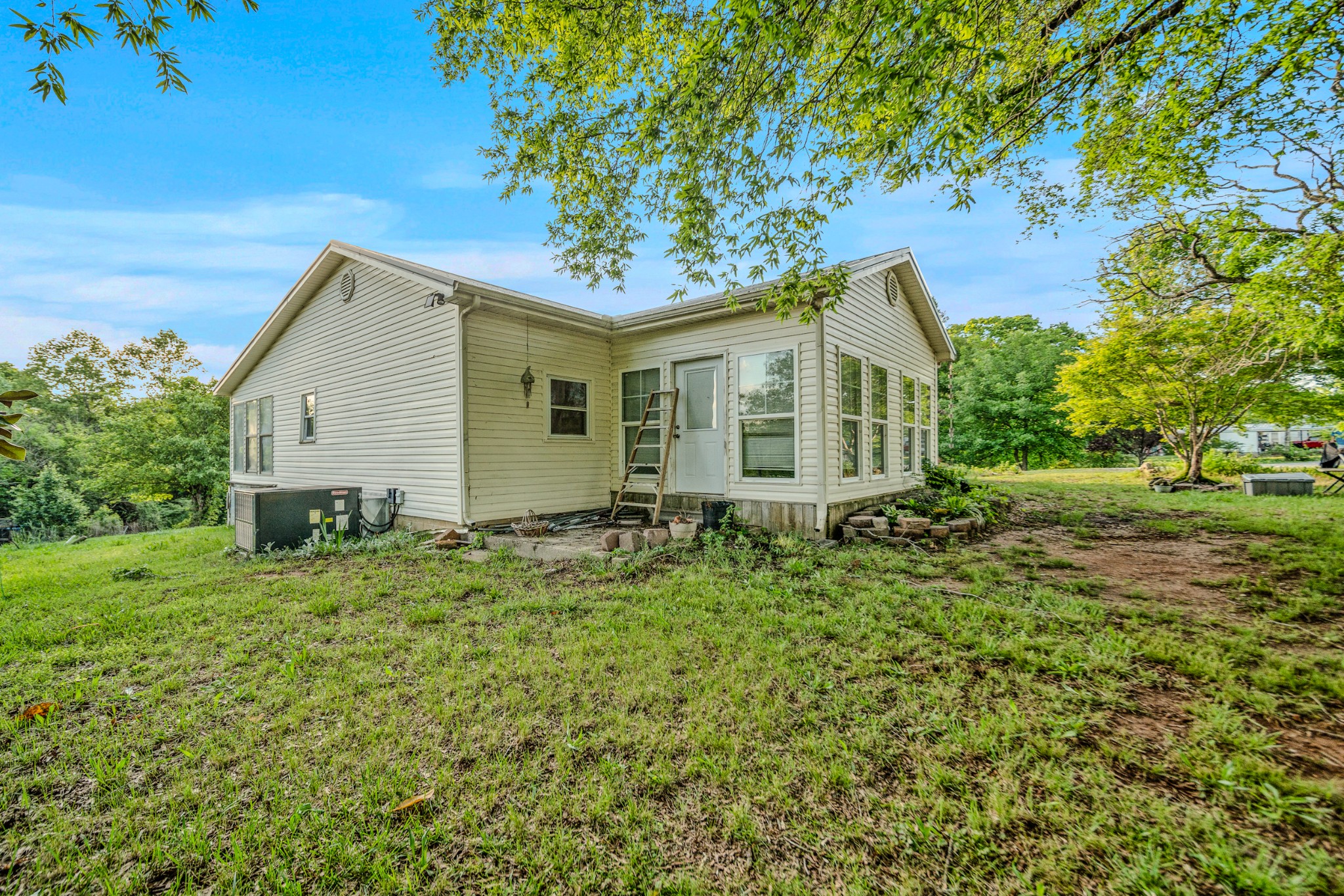 2000 Myers Cove Road McMinnville, TN 37110 - Photo 5 of 76 a view of a house with a backyard