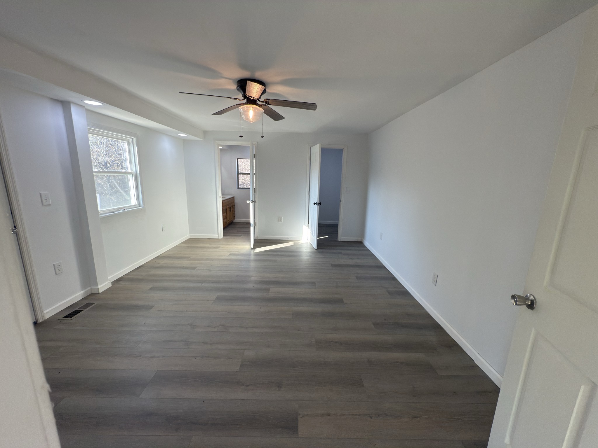 2000 Myers Cove Road McMinnville, TN 37110 - Photo 66 of 76 a view of an empty room with wooden floor and a window