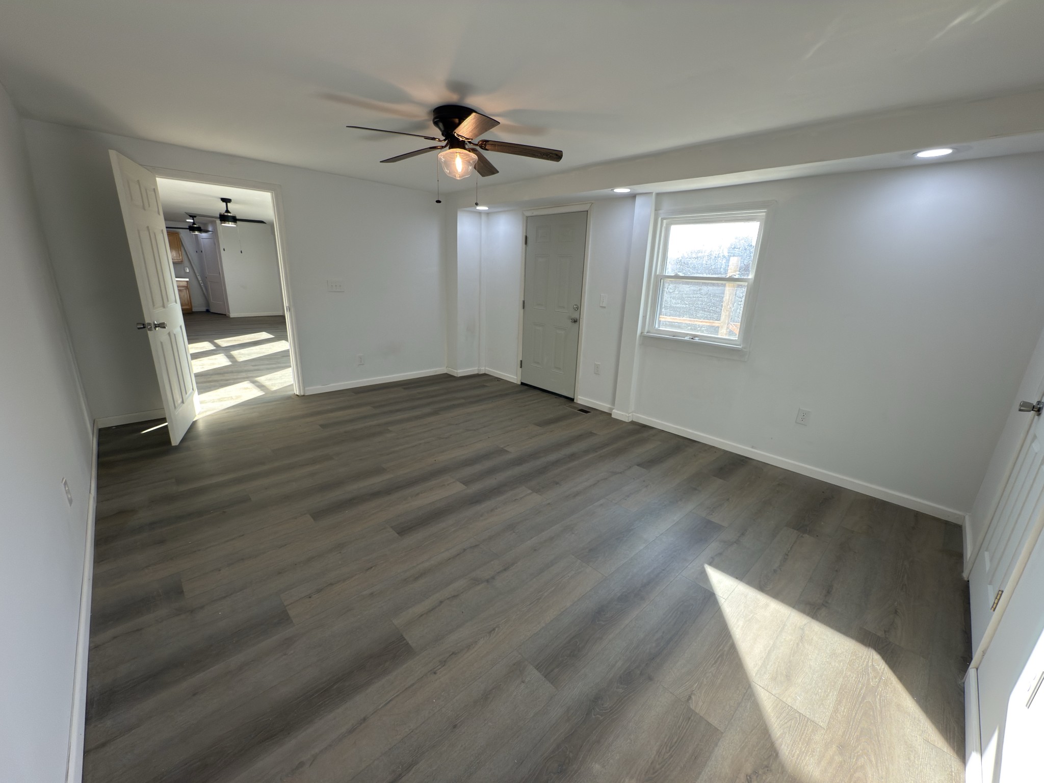 2000 Myers Cove Road McMinnville, TN 37110 - Photo 67 of 76 a view of an empty room with wooden floor and a window