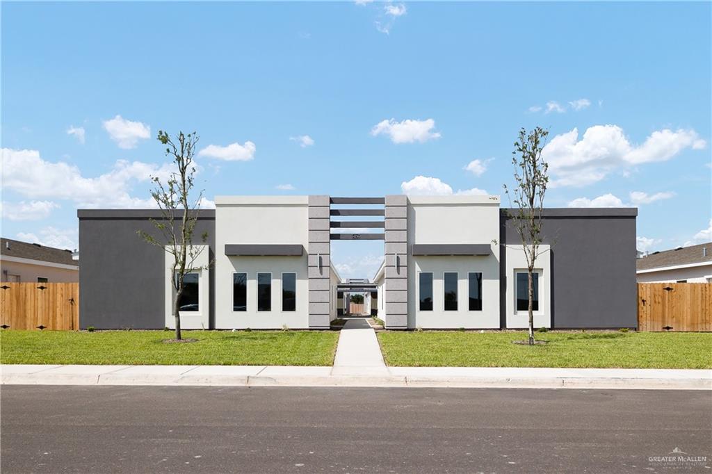 a view of a house with a street