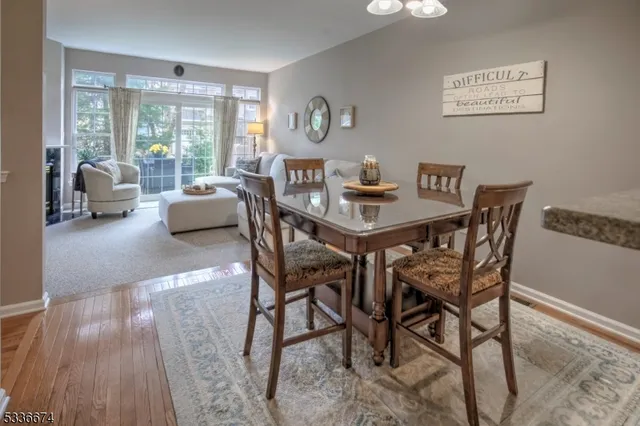 a view of a livingroom with furniture and a table